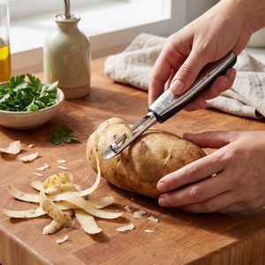 DESCASCADOR_PEELER_INOX_9CM_OXO_MCASSAB -2-